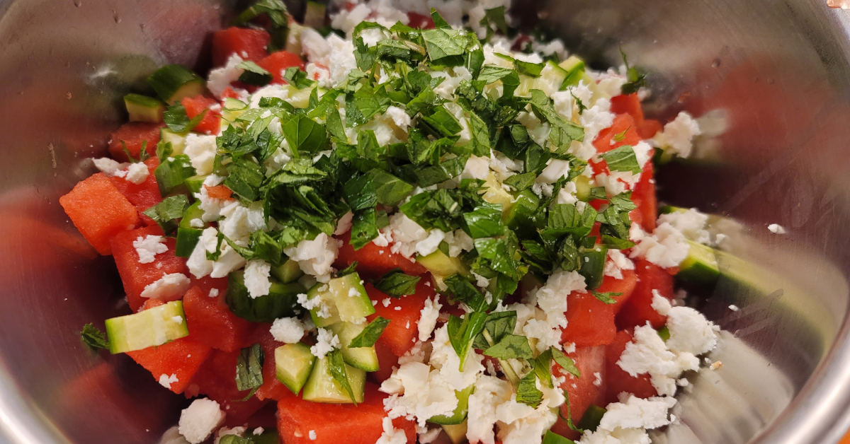 Watermelon feta mint salad in the bowl prior to mixing